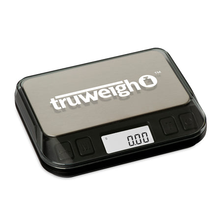 The Truweigh Zenith digital mini scale is turned on and shown on an angle