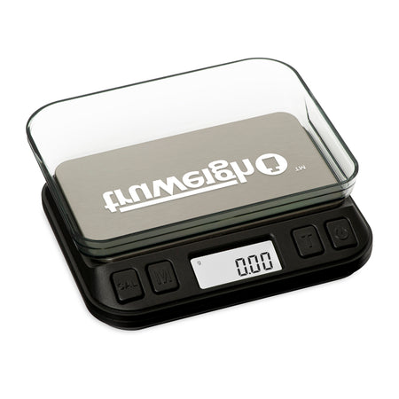 The Truweigh Zenith digital mini scale is turned on with the cover flipped over as a weighing tray
