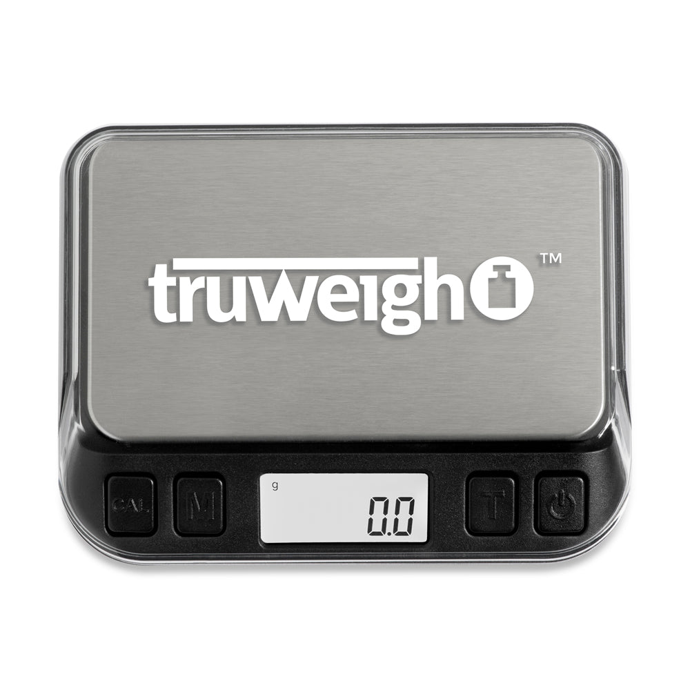 The 600g Truweigh Zenith digital mini scale is turned on with the cover still on