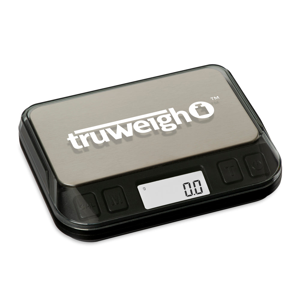 The 600g Truweigh Zenith digital mini scale is turned on with the cover on, shown on an angle
