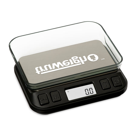 The 600g Truweigh Zenith digital mini scale is turned on with the cover flipped over as a weighing tray